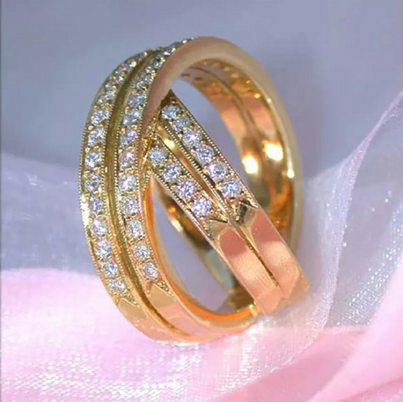 Yellow Gold/White Sapphire Infinity crossover ring. - Picture 6 of 10